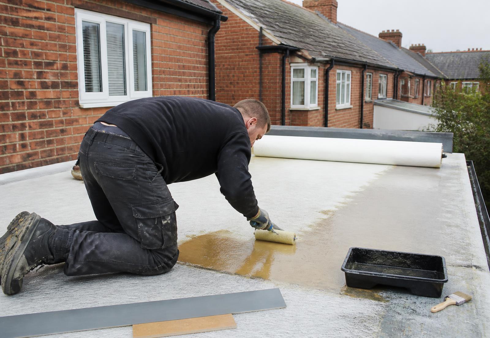 GW Roofing installing a GRP fibreglass flat roof on a house extension